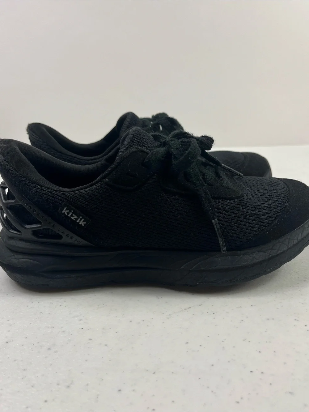 Kizik Kids All-Black Slip-On Athletic Shoe